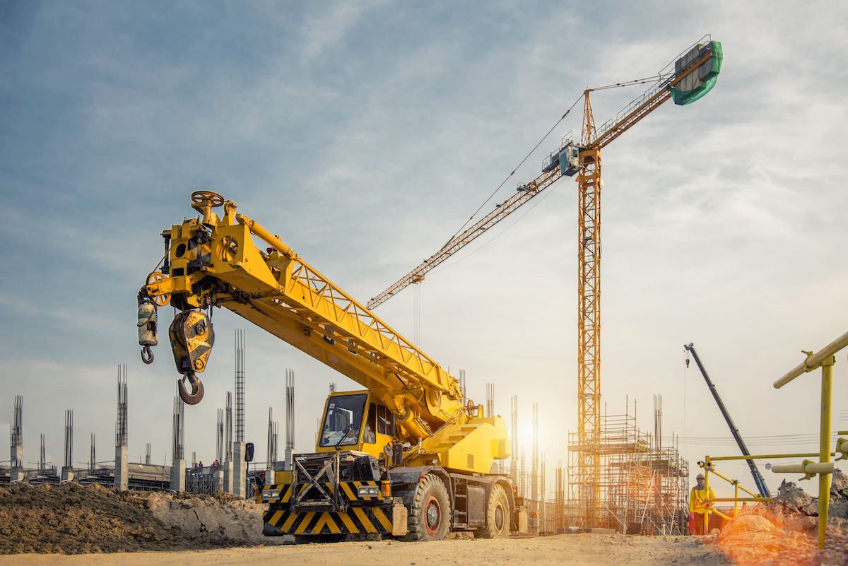 Mobile,Crane,On,A,Road,And,Tower,Crane,In,Construction Wireless mounted camera